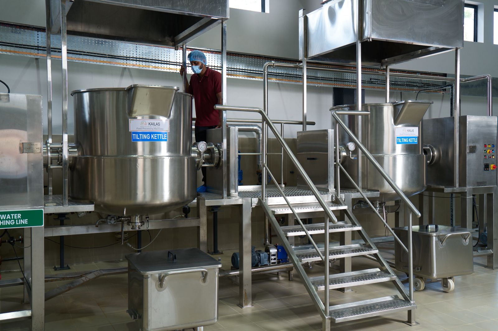 Commercial-scale cooking kettles used during validation of shelf-stable food systems.